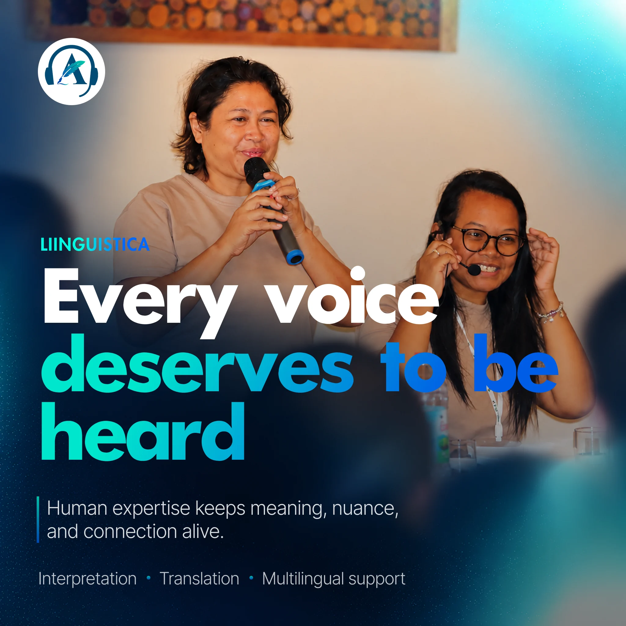 Two Linguistica professionals speaking at an event. The poster reads: Every voice deserves to be heard.